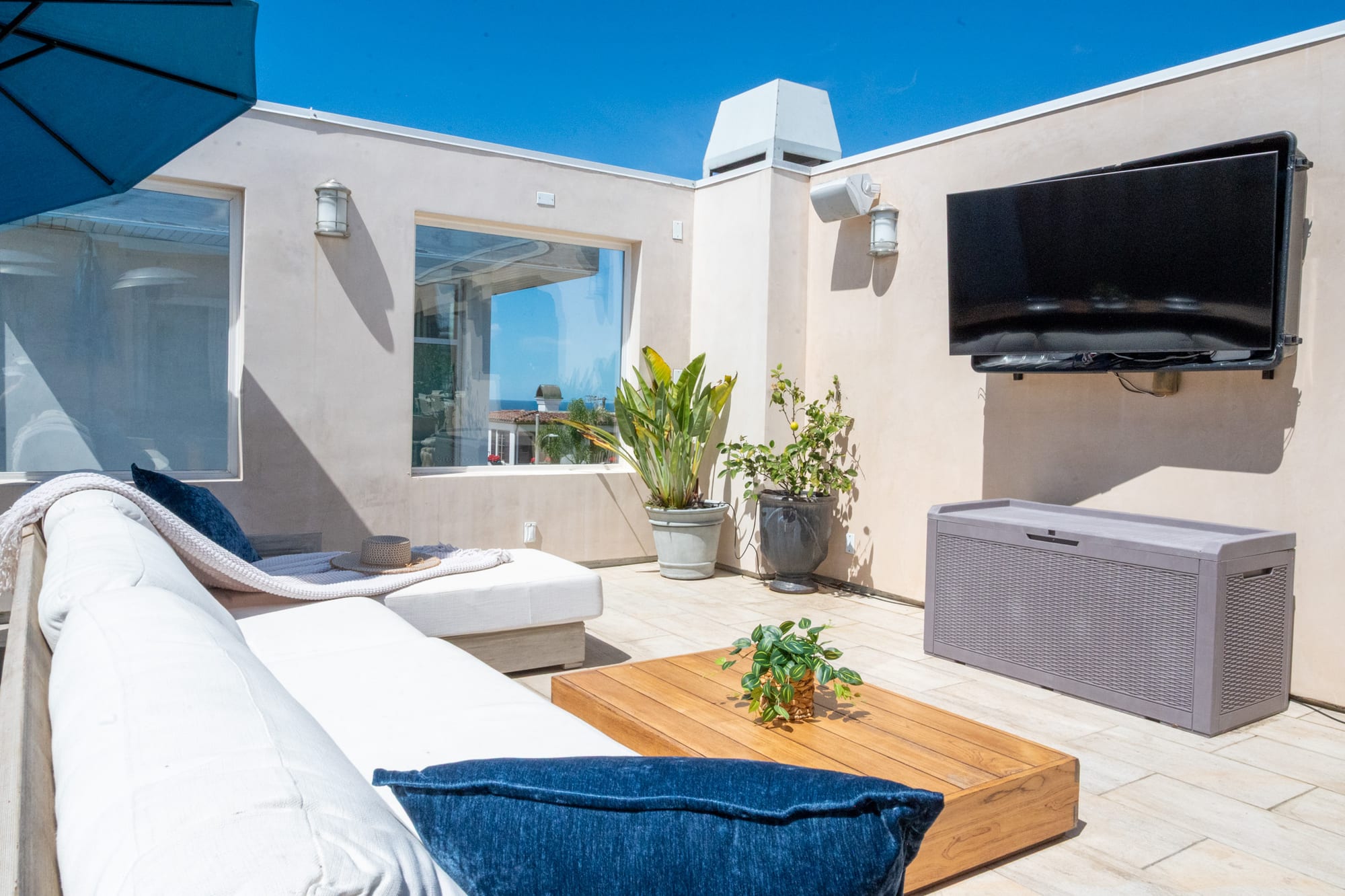 Rooftop deck outdoor lounge with TV at 410 31st Street